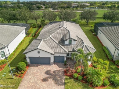 Nestled along the 15th fairway in the sought-after gated on River Hall Country Club in Florida - for sale on GolfHomes.com, golf home, golf lot