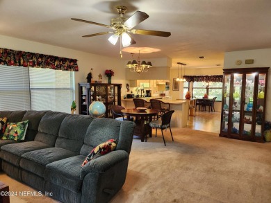 Sturdy brick ranch home with side entry garage.  Located on on Keystone Heights Golf and Country Club in Florida - for sale on GolfHomes.com, golf home, golf lot