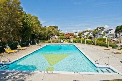 This 2-bedroom, 2-bath, second floor furnished condo in the on The Country Club of the Crystal Coast in North Carolina - for sale on GolfHomes.com, golf home, golf lot