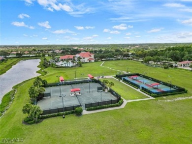 Nestled along the 15th fairway in the sought-after gated on River Hall Country Club in Florida - for sale on GolfHomes.com, golf home, golf lot