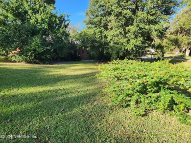 Sturdy brick ranch home with side entry garage.  Located on on Keystone Heights Golf and Country Club in Florida - for sale on GolfHomes.com, golf home, golf lot