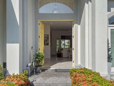Discover a rare opportunity to own a custom-renovated luxury on New Smyrna Beach Golf Course in Florida - for sale on GolfHomes.com, golf home, golf lot
