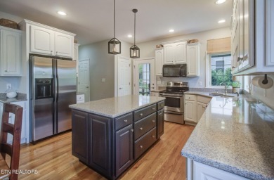 Nestled in the sought-after Tanasi Coves neighborhood of Tellico on Tanasi Golf Course in Tennessee - for sale on GolfHomes.com, golf home, golf lot
