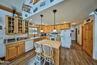 Ideally located just steps from the clubhouse, private lake, and on Grand Lake Golf Course in Colorado - for sale on GolfHomes.com, golf home, golf lot