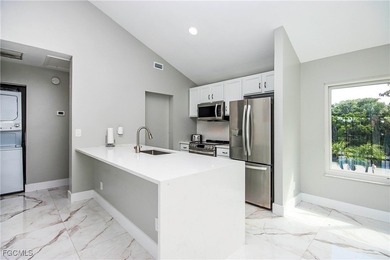The perfect island retreat! Enjoy beautiful lake views from this on The Dunes Golf and Tennis Club in Florida - for sale on GolfHomes.com, golf home, golf lot