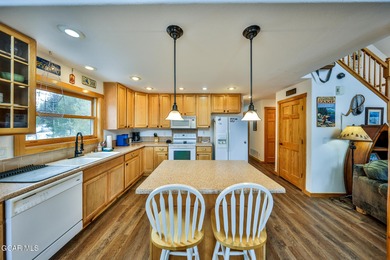 Ideally located just steps from the clubhouse, private lake, and on Grand Lake Golf Course in Colorado - for sale on GolfHomes.com, golf home, golf lot