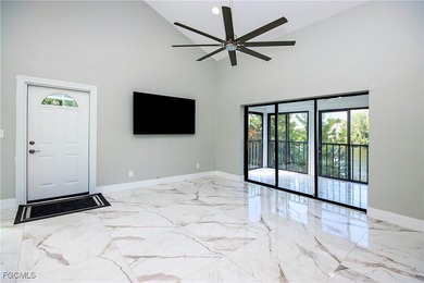 The perfect island retreat! Enjoy beautiful lake views from this on The Dunes Golf and Tennis Club in Florida - for sale on GolfHomes.com, golf home, golf lot
