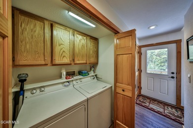 Ideally located just steps from the clubhouse, private lake, and on Grand Lake Golf Course in Colorado - for sale on GolfHomes.com, golf home, golf lot