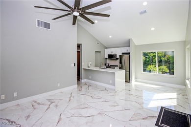 The perfect island retreat! Enjoy beautiful lake views from this on The Dunes Golf and Tennis Club in Florida - for sale on GolfHomes.com, golf home, golf lot