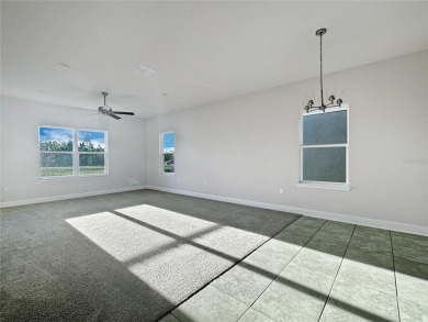 Under Construction. 4 bedrooms and 2.5 bathrooms with no back on Harmony Golf Preserve in Florida - for sale on GolfHomes.com, golf home, golf lot