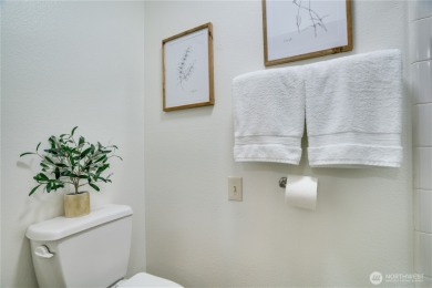 Embrace easy living in this beautifully refreshed 2BD 1.75BA on Highlands Golf Club in Washington - for sale on GolfHomes.com, golf home, golf lot