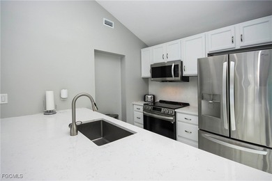 The perfect island retreat! Enjoy beautiful lake views from this on The Dunes Golf and Tennis Club in Florida - for sale on GolfHomes.com, golf home, golf lot