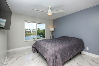 The perfect island retreat! Enjoy beautiful lake views from this on The Dunes Golf and Tennis Club in Florida - for sale on GolfHomes.com, golf home, golf lot
