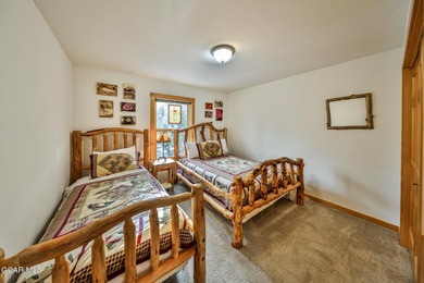 Ideally located just steps from the clubhouse, private lake, and on Grand Lake Golf Course in Colorado - for sale on GolfHomes.com, golf home, golf lot