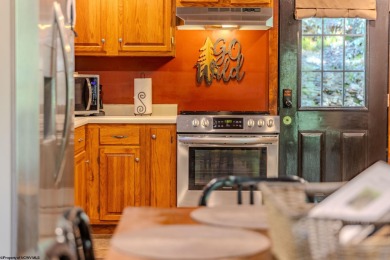 Remodeled Mountain Retreat with Unmatched Charm! - Welcome to on Alpine Lake Resort in West Virginia - for sale on GolfHomes.com, golf home, golf lot
