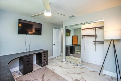 The perfect island retreat! Enjoy beautiful lake views from this on The Dunes Golf and Tennis Club in Florida - for sale on GolfHomes.com, golf home, golf lot