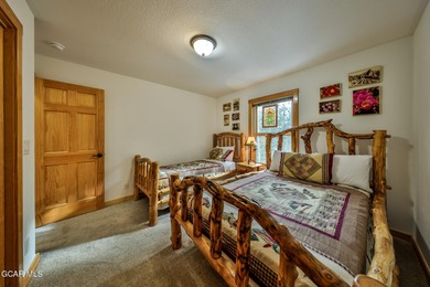 Ideally located just steps from the clubhouse, private lake, and on Grand Lake Golf Course in Colorado - for sale on GolfHomes.com, golf home, golf lot