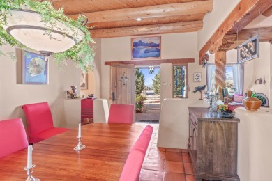 Enjoy indoor and outdoor living spaces as you take in on Taos Country Club in New Mexico - for sale on GolfHomes.com, golf home, golf lot