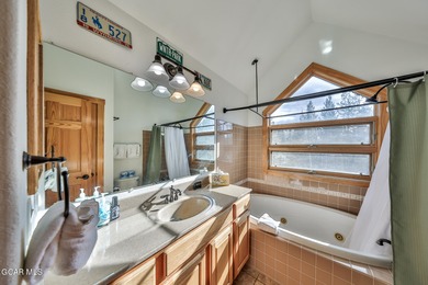 Ideally located just steps from the clubhouse, private lake, and on Grand Lake Golf Course in Colorado - for sale on GolfHomes.com, golf home, golf lot