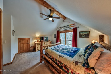 Ideally located just steps from the clubhouse, private lake, and on Grand Lake Golf Course in Colorado - for sale on GolfHomes.com, golf home, golf lot