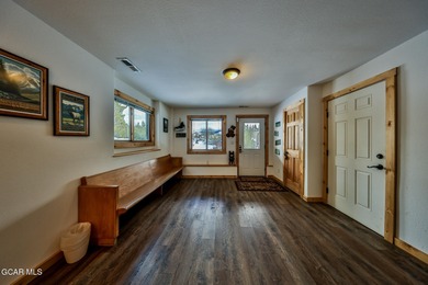 Ideally located just steps from the clubhouse, private lake, and on Grand Lake Golf Course in Colorado - for sale on GolfHomes.com, golf home, golf lot