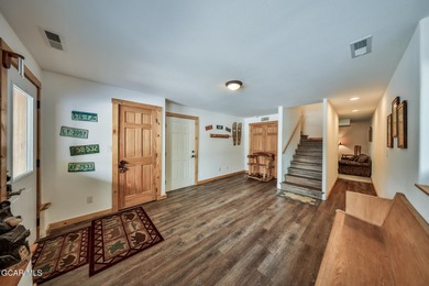 Ideally located just steps from the clubhouse, private lake, and on Grand Lake Golf Course in Colorado - for sale on GolfHomes.com, golf home, golf lot