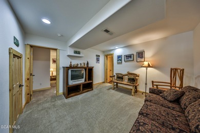 Ideally located just steps from the clubhouse, private lake, and on Grand Lake Golf Course in Colorado - for sale on GolfHomes.com, golf home, golf lot