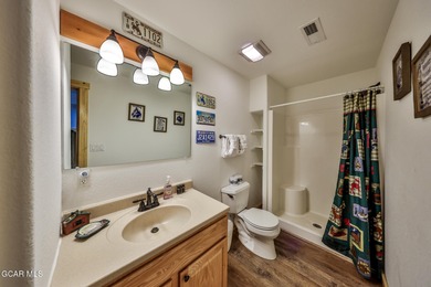 Ideally located just steps from the clubhouse, private lake, and on Grand Lake Golf Course in Colorado - for sale on GolfHomes.com, golf home, golf lot