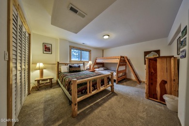 Ideally located just steps from the clubhouse, private lake, and on Grand Lake Golf Course in Colorado - for sale on GolfHomes.com, golf home, golf lot