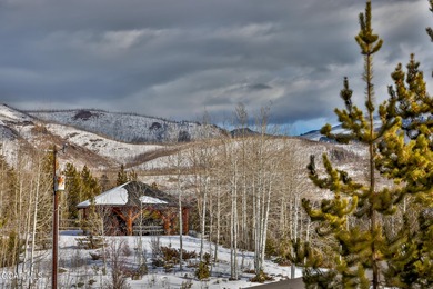 Ideally located just steps from the clubhouse, private lake, and on Grand Lake Golf Course in Colorado - for sale on GolfHomes.com, golf home, golf lot