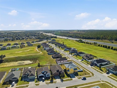 One or more photo(s) has been virtually staged. Located within on Sherman Hills Golf Club in Florida - for sale on GolfHomes.com, golf home, golf lot