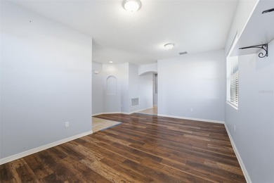 One or more photo(s) has been virtually staged. Located within on Sherman Hills Golf Club in Florida - for sale on GolfHomes.com, golf home, golf lot