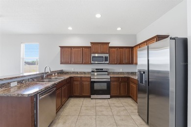 One or more photo(s) has been virtually staged. Located within on Sherman Hills Golf Club in Florida - for sale on GolfHomes.com, golf home, golf lot