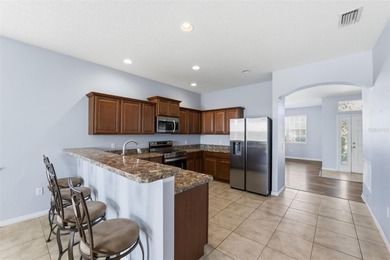 One or more photo(s) has been virtually staged. Located within on Sherman Hills Golf Club in Florida - for sale on GolfHomes.com, golf home, golf lot