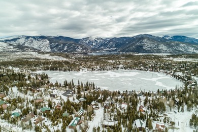 Ideally located just steps from the clubhouse, private lake, and on Grand Lake Golf Course in Colorado - for sale on GolfHomes.com, golf home, golf lot