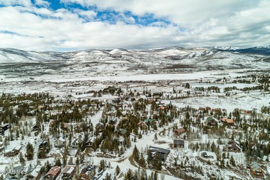 Ideally located just steps from the clubhouse, private lake, and on Grand Lake Golf Course in Colorado - for sale on GolfHomes.com, golf home, golf lot