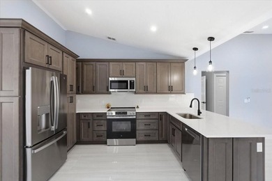 Better Than New and exceptionally upgraded, this stunning home on The Grand Club Cypress Course in Florida - for sale on GolfHomes.com, golf home, golf lot