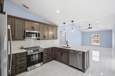 Better Than New and exceptionally upgraded, this stunning home on The Grand Club Cypress Course in Florida - for sale on GolfHomes.com, golf home, golf lot