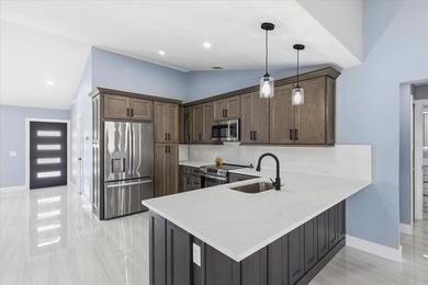 Better Than New and exceptionally upgraded, this stunning home on The Grand Club Cypress Course in Florida - for sale on GolfHomes.com, golf home, golf lot