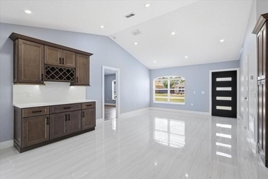 Better Than New and exceptionally upgraded, this stunning home on The Grand Club Cypress Course in Florida - for sale on GolfHomes.com, golf home, golf lot