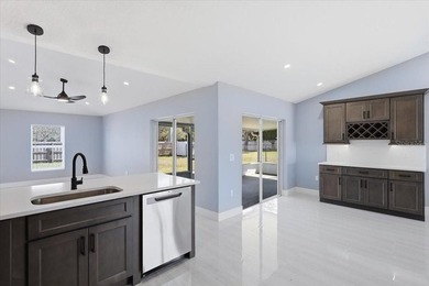 Better Than New and exceptionally upgraded, this stunning home on The Grand Club Cypress Course in Florida - for sale on GolfHomes.com, golf home, golf lot