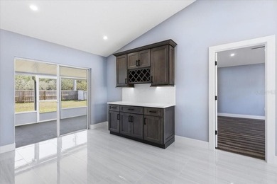 Better Than New and exceptionally upgraded, this stunning home on The Grand Club Cypress Course in Florida - for sale on GolfHomes.com, golf home, golf lot