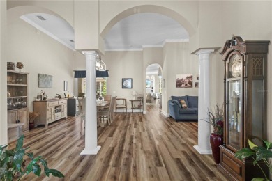 Step into timeless Florida living in this spacious and move in on Heritage Isles Golf and Country Club in Florida - for sale on GolfHomes.com, golf home, golf lot