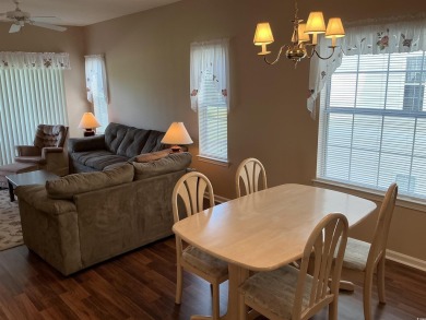 This immaculate 2nd-floor condo in the highly sought-after River on River Oaks Golf Plantation  in South Carolina - for sale on GolfHomes.com, golf home, golf lot
