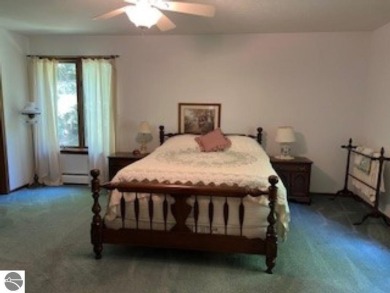 This home in the attractive Michabou Shores Subdivision is about on Crystal Downs Country Club in Michigan - for sale on GolfHomes.com, golf home, golf lot