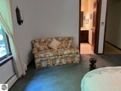 This home in the attractive Michabou Shores Subdivision is about on Crystal Downs Country Club in Michigan - for sale on GolfHomes.com, golf home, golf lot