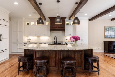 Truly one-of-a-kind, 1102 Eldon Way is a breathtaking custom on Coachmans Golf Resort in Wisconsin - for sale on GolfHomes.com, golf home, golf lot