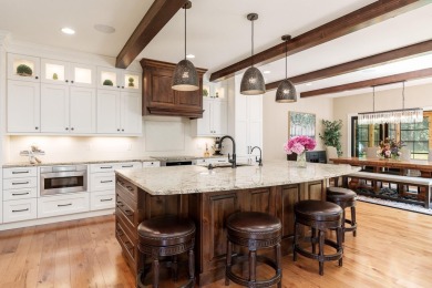 Truly one-of-a-kind, 1102 Eldon Way is a breathtaking custom on Coachmans Golf Resort in Wisconsin - for sale on GolfHomes.com, golf home, golf lot