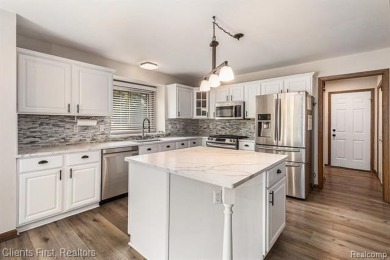 Move-in ready with immediate occupancy! This beautiful colonial on Pheasant Run Golf Club in Michigan - for sale on GolfHomes.com, golf home, golf lot