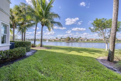 This highly upgraded carriage home in Jupiter Country Club on Jupiter Country Club in Florida - for sale on GolfHomes.com, golf home, golf lot